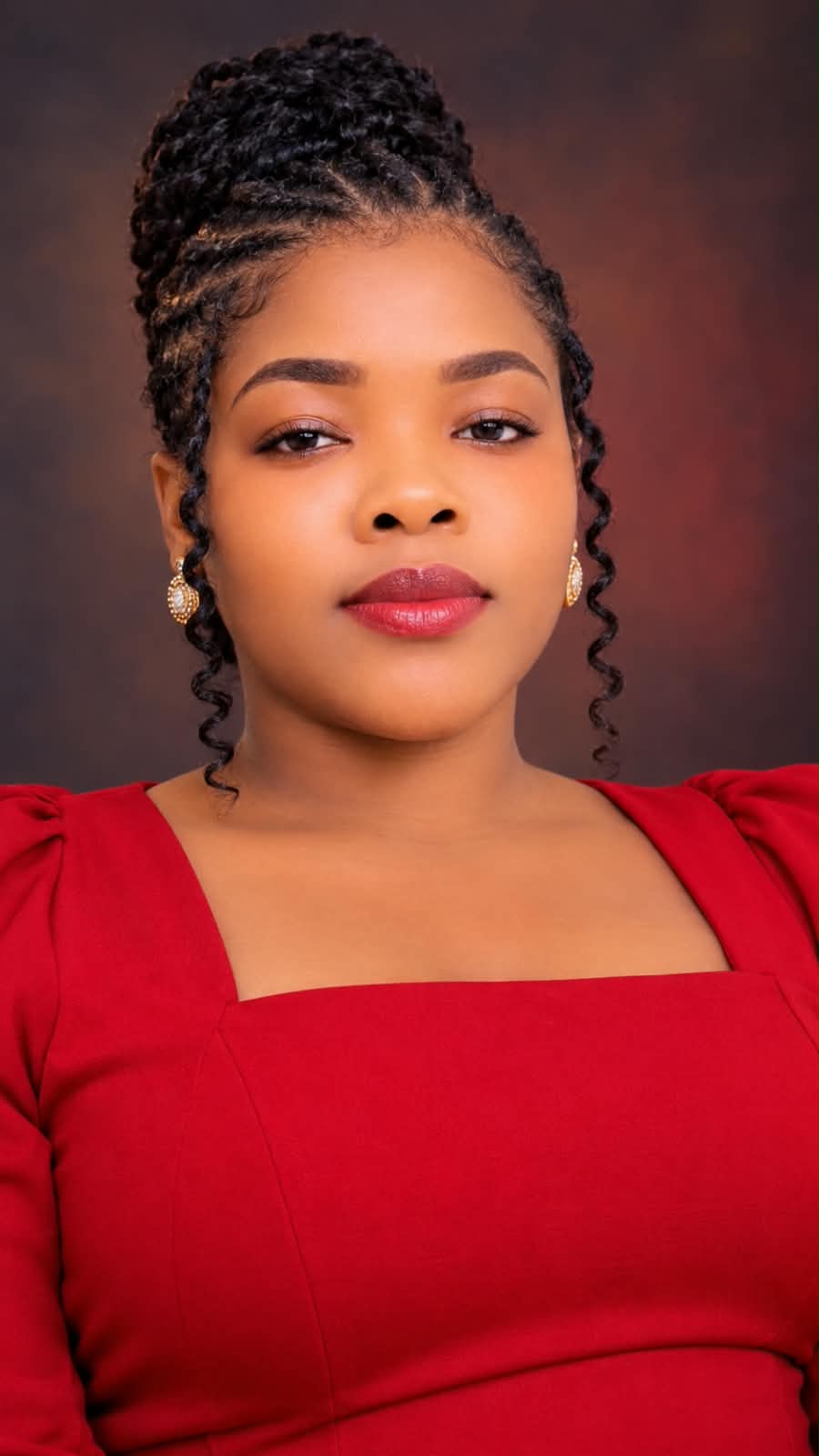 Glory David in red dress portrait